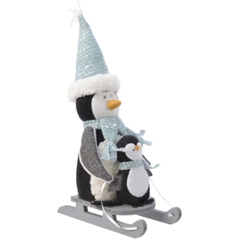 Pinguin mit blauem Schlitten