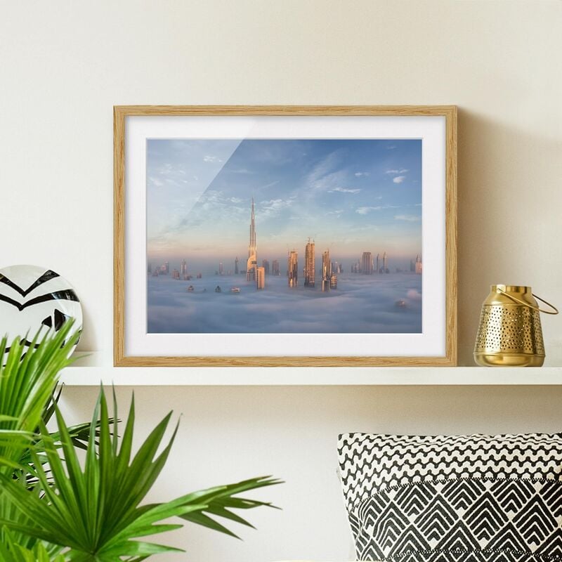 

Póster enmarcado - Dubai Sopra Le Nuvole Dimensión LxA: 18cm x 24cm, Marco: Roble