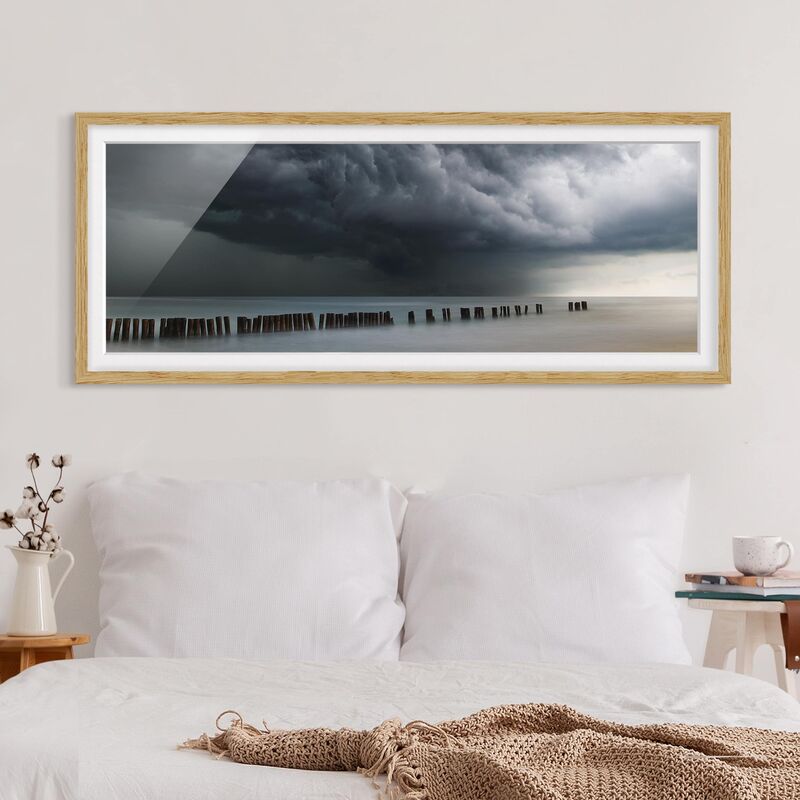 

Póster enmarcado - Nubi di tempesta sul Mar Baltico Dimensión LxA: 50cm x 130cm, Marco: Roble