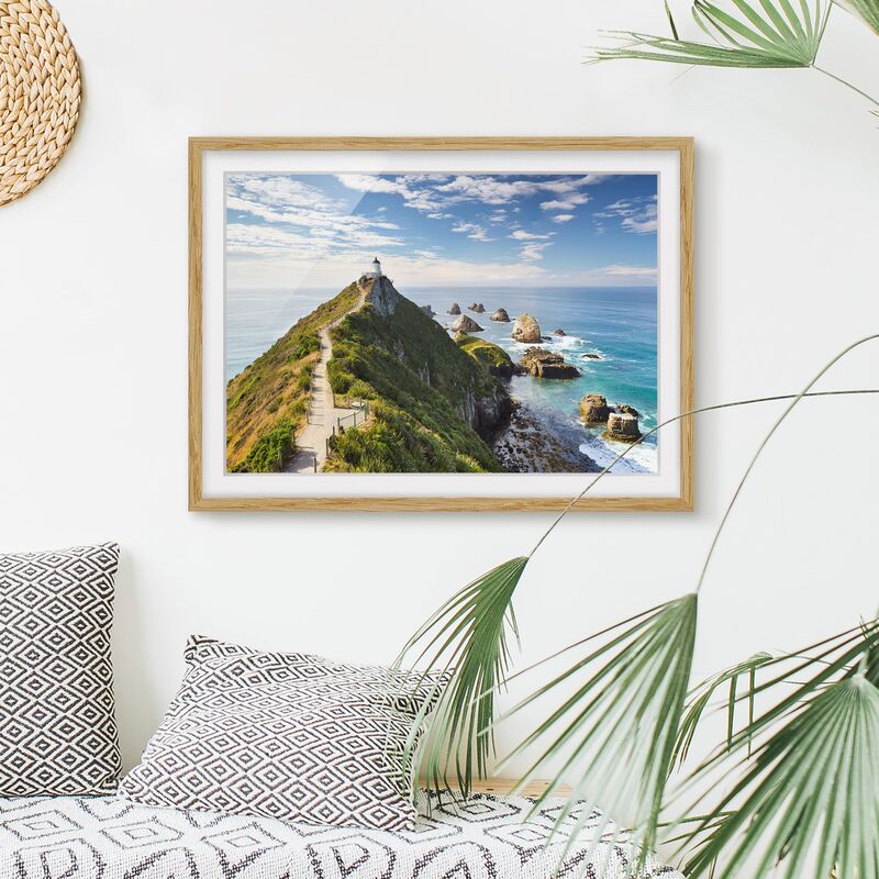 

Póster enmarcado - Nugget Point Lighthouse And Sea Zealand Dimensión LxA: 70cm x 100cm, Marco: Roble