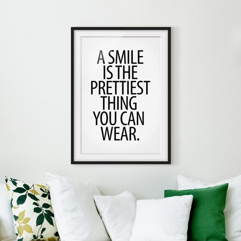 

Póster enmarcado - A Smile Is The Prettiest Thing Sans Serif Dimensión LxA: 24cm x 18cm, Marco: Negro