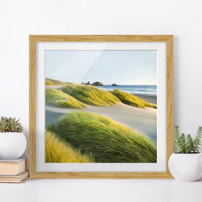 

Póster enmarcado - Dunes And Grasses At The Sea Dimensión LxA: 30cm x 30cm, Marco: Roble