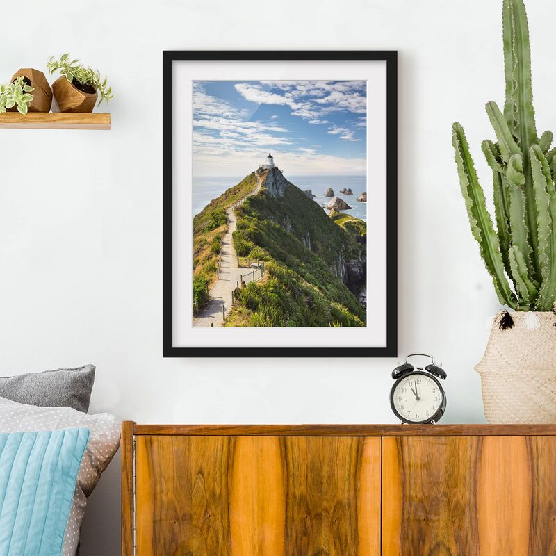 

Póster enmarcado - Nugget Point Lighthouse And Sea Zealand Dimensión LxA: 70cm x 50cm, Marco: Negro