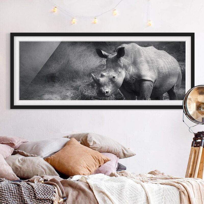 

Póster enmarcado - Rhinoceros Lonesome Dimensión LxA: 50cm x 130cm, Marco: Negro