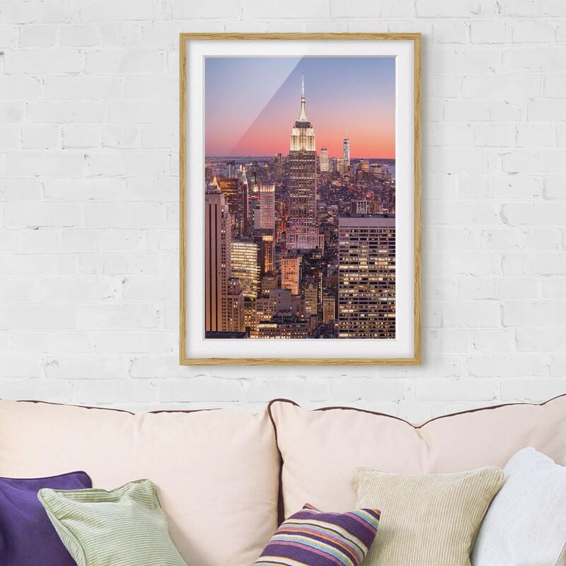 

Póster enmarcado - Sunset Manhattan New York City Dimensión LxA: 55cm x 40cm, Marco: Roble