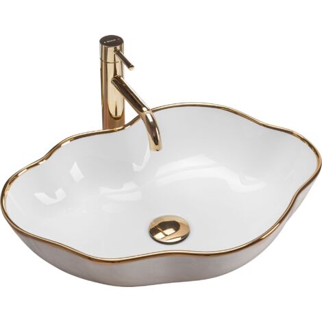 REA – Vasque à poser céramique blanche brillante – Forme ovale asymétrique – Longueur 515mm – Largeur 375mm – Hauteur 135mm – Montage sur plan de travail