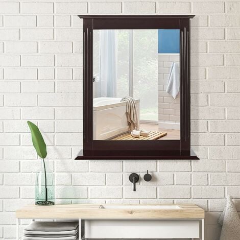 La tablette murale sous le miroir pour une salle de bains