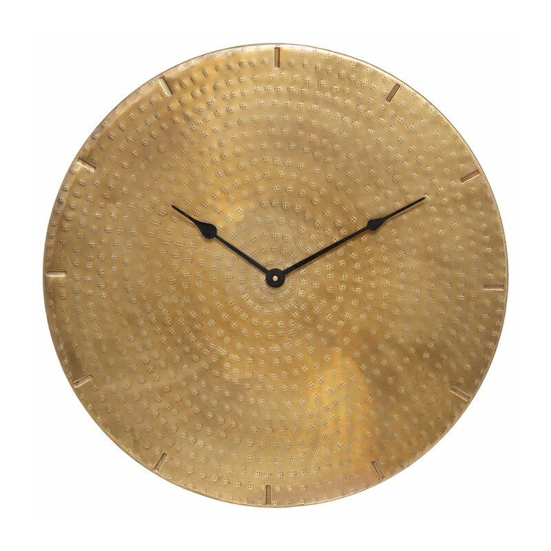 

Reloj de pared de metal dorado