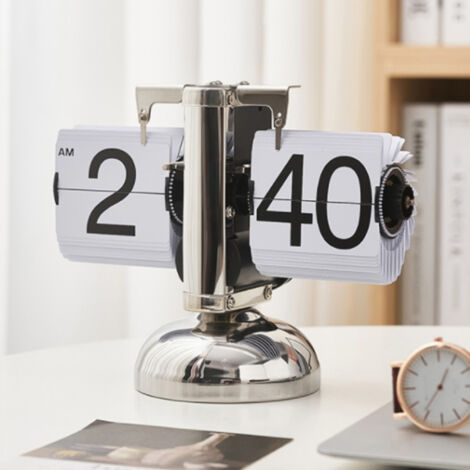 Reloj digital plegable minimalista de estilo retro, de una sola pata, automático, de color blanco, con un elegante diseño de lujo para oficina o sala de estar.