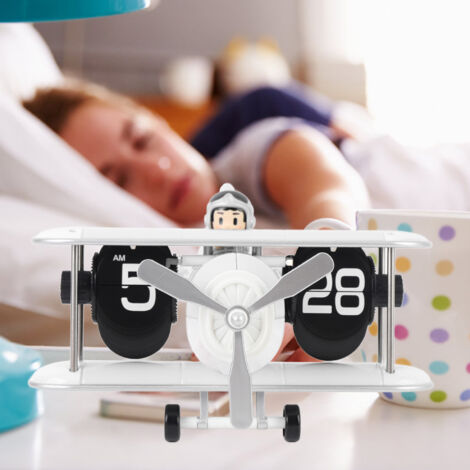 Reloj plegable de 12 horas con forma de avión – Plástico blanco, 215 x 212 mm – Incluye pila AA – Diseño retro con función de plegado automático