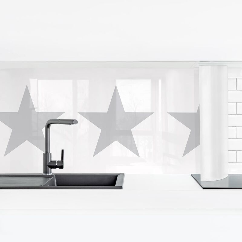 

Revestimiento pared cocina - Big Gray Stars On White Dimensión LxA: 80cm x 280cm Material: Premium