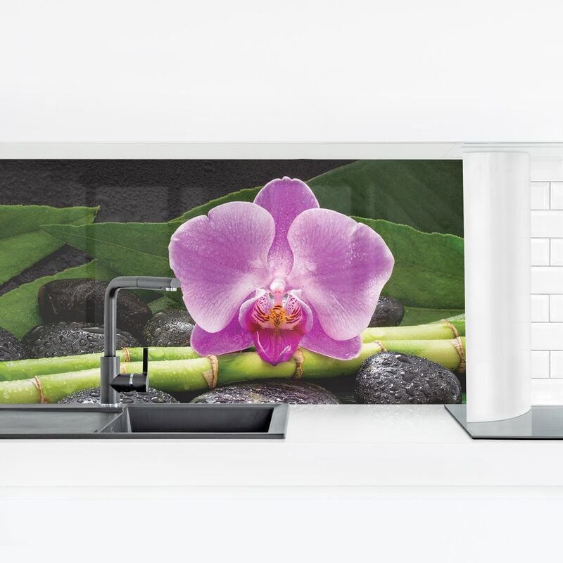 

Revestimiento pared cocina - Green Bamboo With Orchid Blossom Dimensión LxA: 60cm x 210cm Material: Magnético