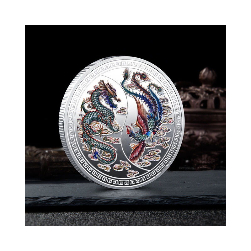 Ricchezza portata dal drago e dalla fenice moneta