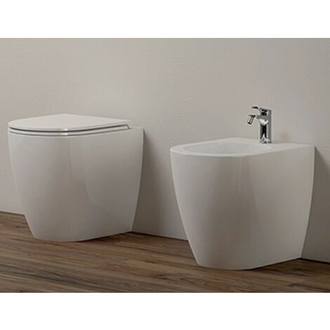 Sanitari Comoda filomuro senza brida cm. 53x36 con sedile sottile