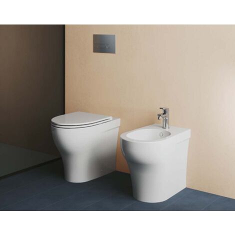 Sanitari Pratica filomuro con scarico traslato senza brida con