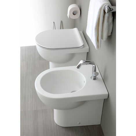 Sanitari Quick filomuro senza brida cm. 51x36 con sedile