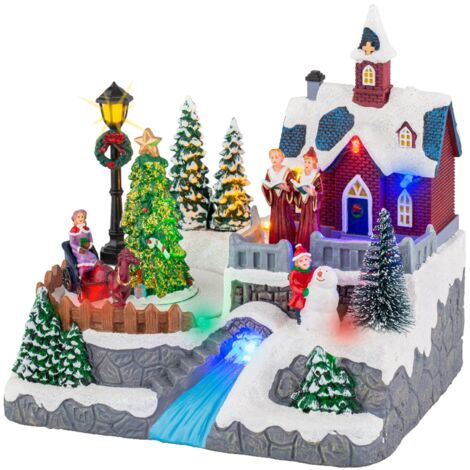 Scena animata per villaggio di Natale con personaggi con luci e movimento h 19 cm -Con negozio dei regali