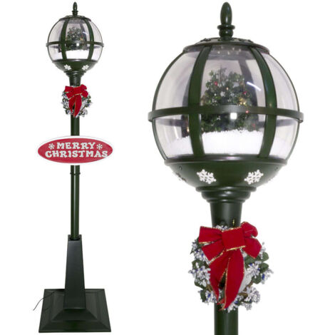 Schneiende LED Laterne 175cm mit geschmücktem Weihnachtsbaum und Merry Christmas Schild