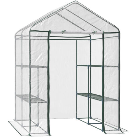 Serre multi-étagères verte et translucide à trois niveaux. Cadre en acier et couverture PVC souple pour la culture simple de plantes d’intérieur.
