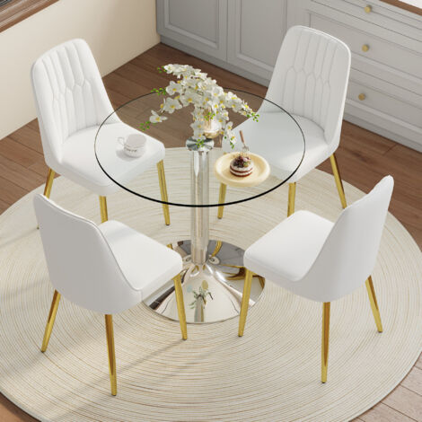 Set de table moderne et minimaliste, fabriqué en verre sécurisé. Le diamètre est de 85 cm. Le set comprend également 4 chaises blanches en PU, avec des pieds dorés. Idéal pour les salles à manger, les