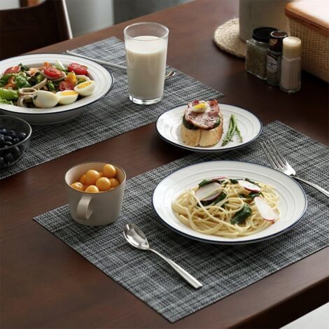 Set di 4 tovagliette in PVC antiscivolo, resistenti al calore e lavabili - grigie