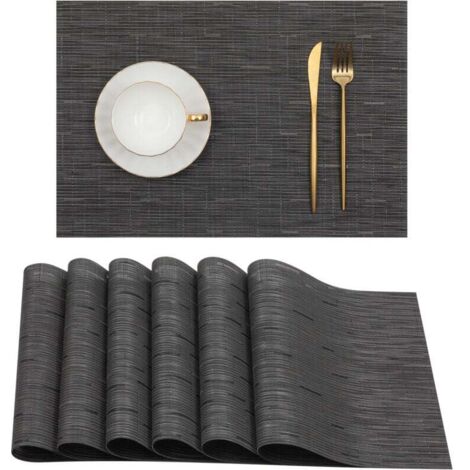 Set mit 6 schwarzen Tischsets für Esstische. Abwaschbare Tischsets aus hitzebeständigem PVC, 45 x 30 cm.