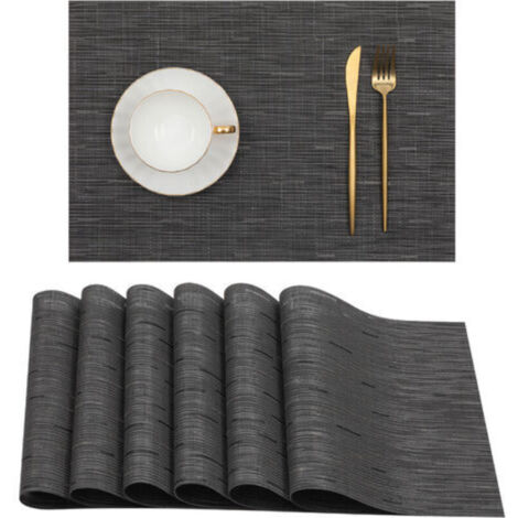 Set mit 6 schwarzen Tischsets für Esstische. Abwaschbare Tischsets aus hitzebeständigem PVC, 45 x 30 cm.