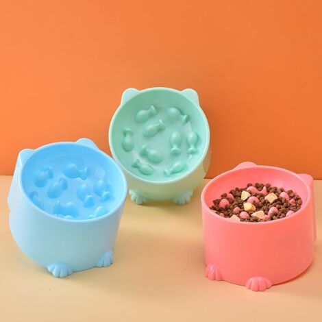 Set of 3 raised plastic cat bowls with non-slip mat for slow and dry feeding.