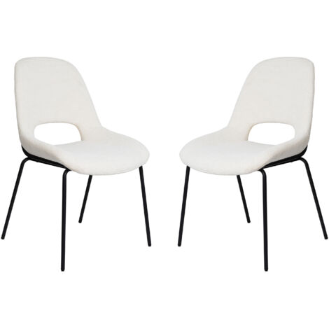 Silla de diseño escandinavo en tejido bouclé blanco, respaldo calado, patas de metal negro — comedor / oficina