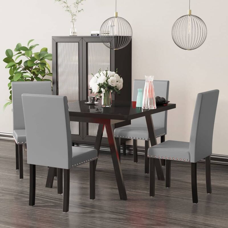 

Sillas de comedor 4 unidades gris PVC