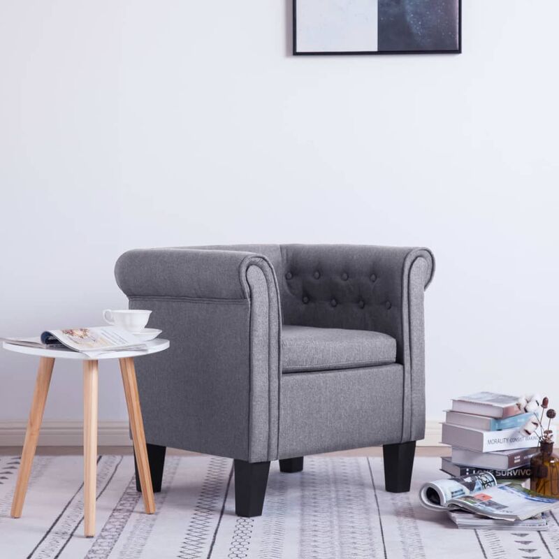 

Sillon con cojin de tela gris claro