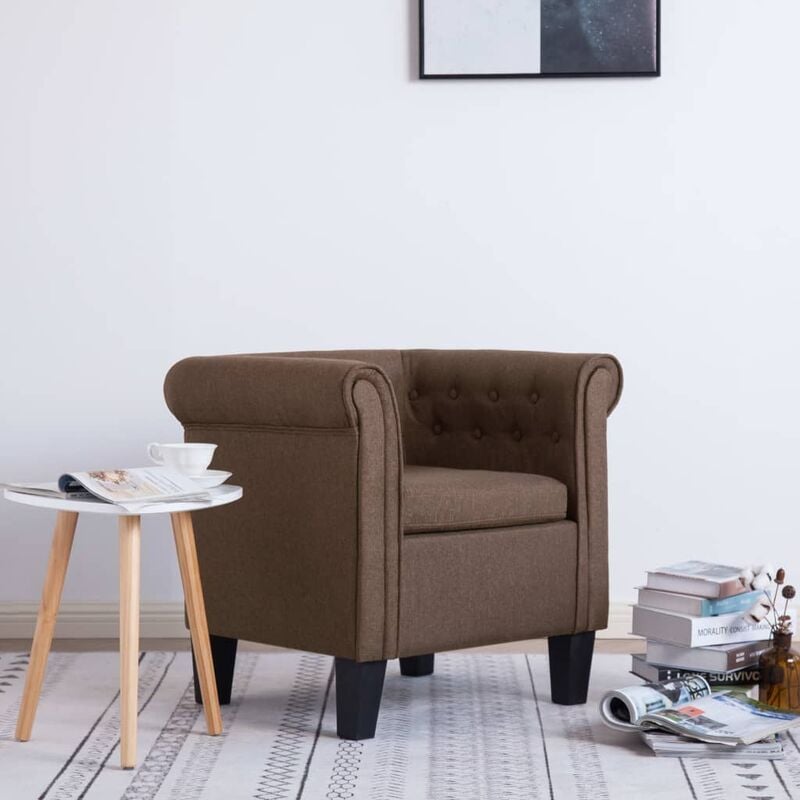 

Sillón con cojín de tela marrón