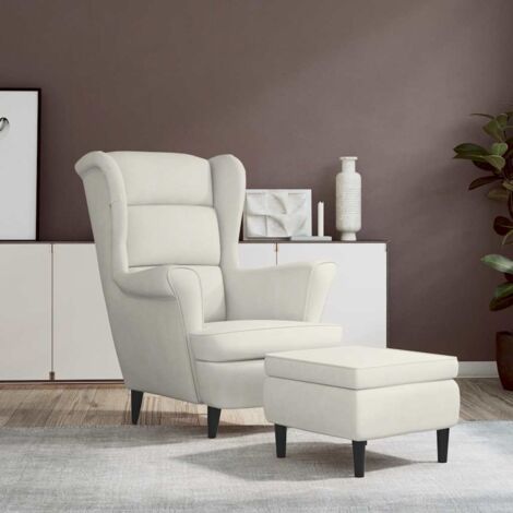 Sillón orejero y taburete de terciopelo crema