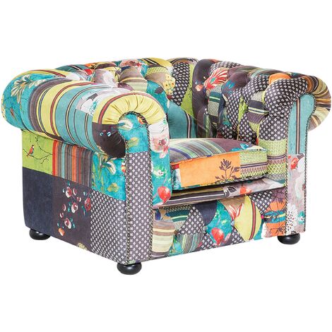 Sillón tejido verde amarillo copetudo reposabrazos enrollados patchwork estilo ecléctico Chesterfield