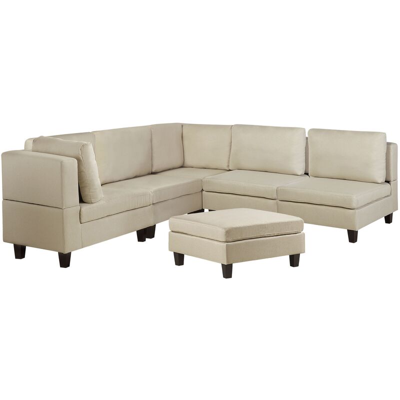 

Sofá esquinero tapizado beige con reposapiés FEVIK