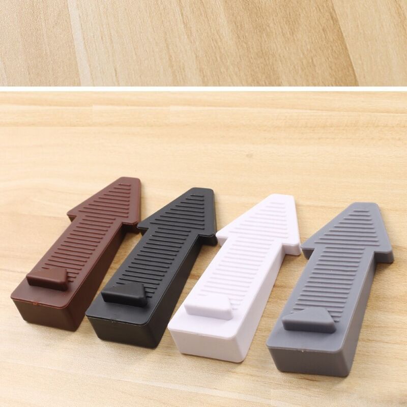 Sollbry - Topes de puerta de goma antideslizantes, duraderos y resistentes, ideales para todo tipo de superficies (forma de flecha, 4 colores)