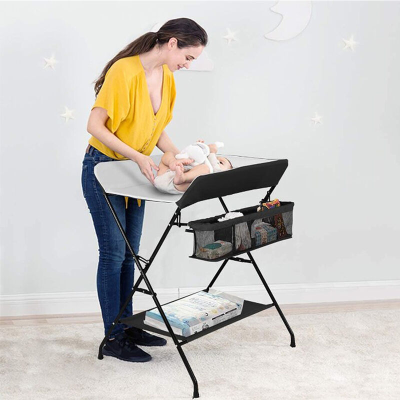 Table à Langer Pliante pour Bébé avec Panier de Rangement à Côté, Charge Max 25KG,7955.596 cm,noir + blanc