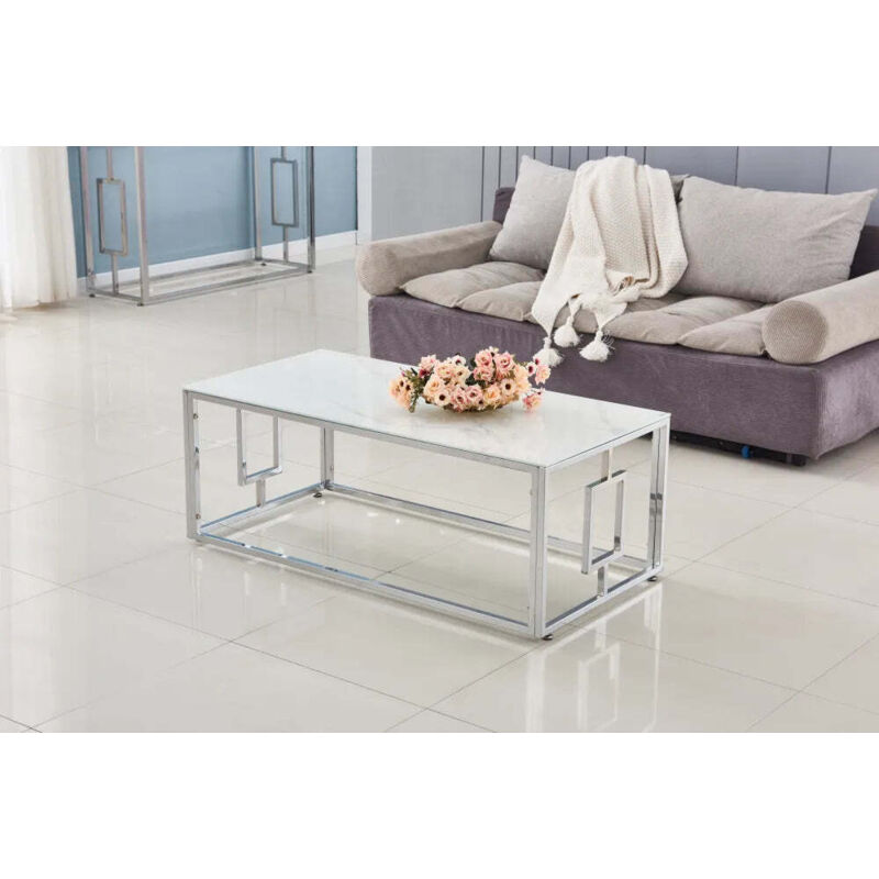 Homy France - Table basse plateau en verre transparent pieds chromés 120 cm - sophie