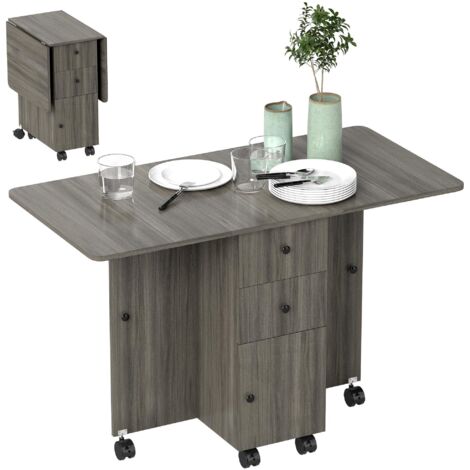 Table de cuisine pliante avec deux étagères pliantes, deux tiroirs et un placard, grise, adaptée à un usage en cuisine.