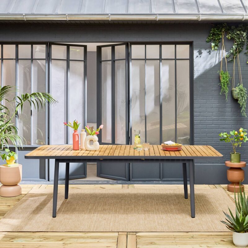 Table de jardin extensible en bois teck. structure aluminium anthracite. 8 places