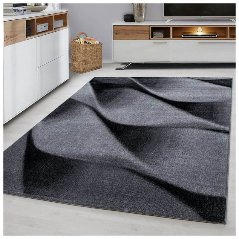 Tapis contemporain effet courbe Noghar Noir 160x230