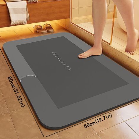 Tapis de sol anti-fatigue gris, grand format, rembourré, pour cuisine, bureau et salle de bain, design ergonomique pour un confort optimal.