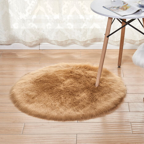 Tapis rond en peluche de couleur unie