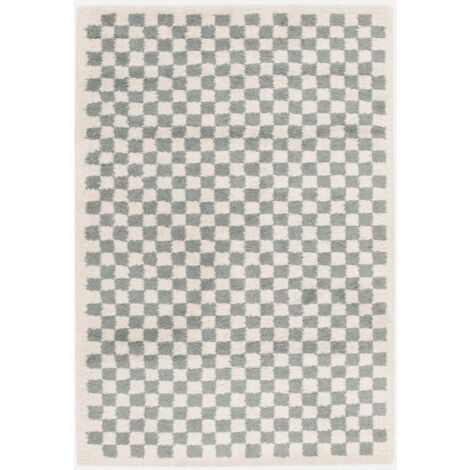Tappeto a scacchiera di colore azzurro e crema