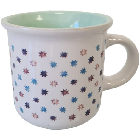 Tasse blanche et verte en grès motif étoiles
