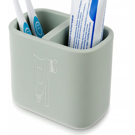 Tazza da bagno verde a due scomparti con porta spazzolino da denti.