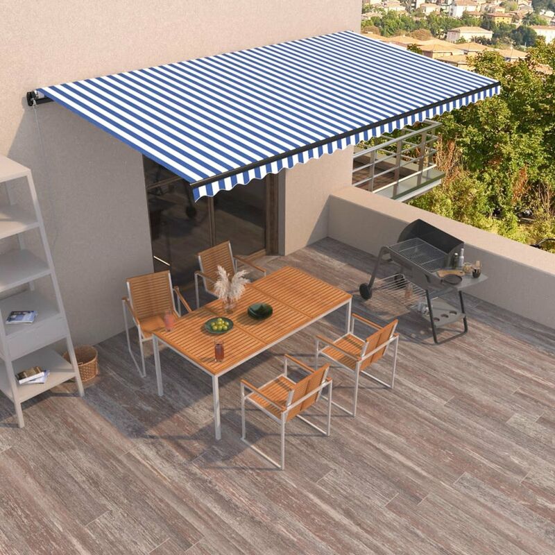 

Toldo manual retractil azul y blanco 600x350 cm