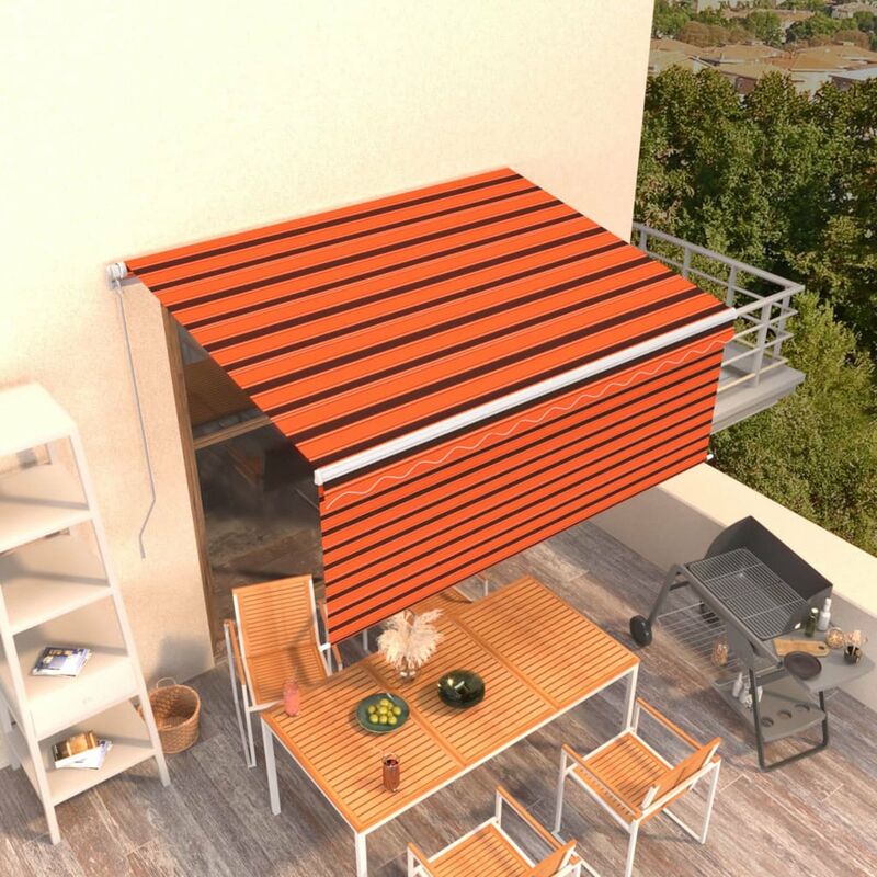 

Toldo manual retractil con persiana naranja y marron 3x2,5m