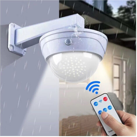 Trade Shop - TELECAMERA FINTA CON PANNELLO SOLARE MIT SENSOR MOVEMENT 44LED FARETTO LUCE -