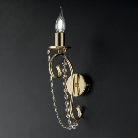 Un aplique de hierro dorado claro con pedrería 16x h32 cm